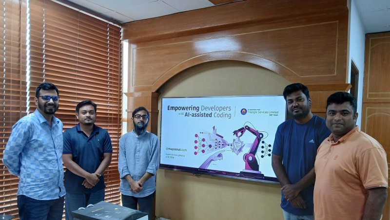 Mayeenul Islam stood as a trainer with 4 (+1) Trainee on the session of Empowering Developers with AI-Assisted Coding for TRIANGLE Services
                                            Ltd.